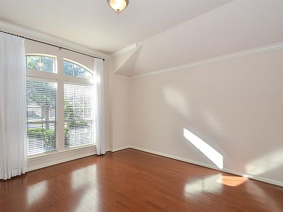Gorgeous hardwoods and great natural light in the formal living room!