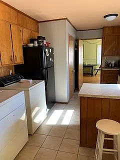 kitchen 
with pantry closet 
and laundry hookup