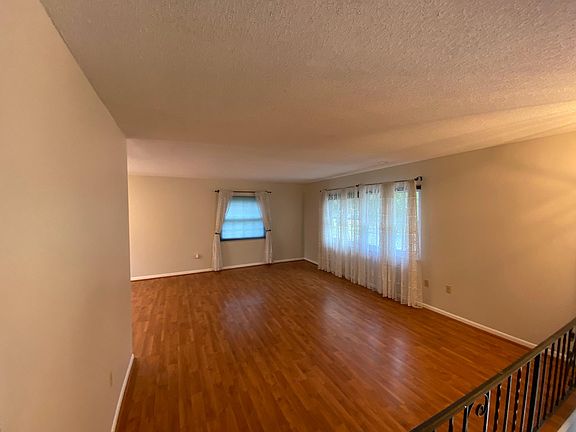 Living room offers welcoming space for family and entertaining.