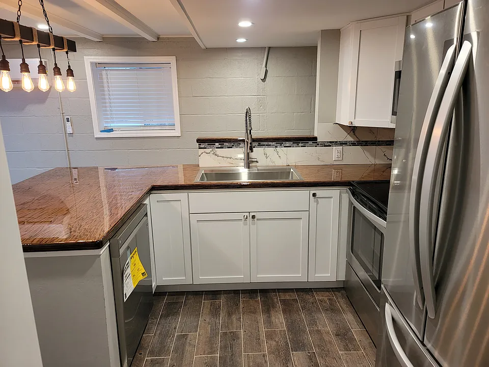 Kitchen with all appliances -- stainless steel dishwasher, microwave, stove, refrigerator, barn sink, good cabinet space with lazy susan!