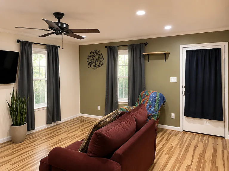 living room with ceiling fan