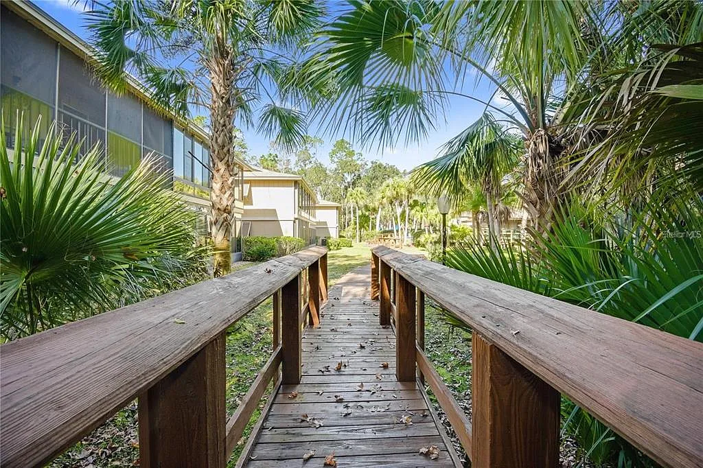 Building Photo - 120 Hibiscus Woods Ct #4B