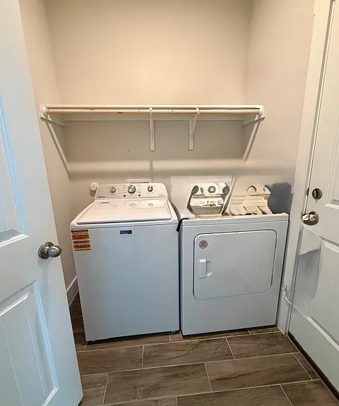 Laundry room with washer and dryer included