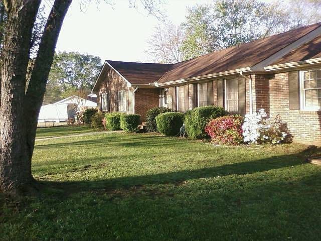 Front view with azaleas blooming