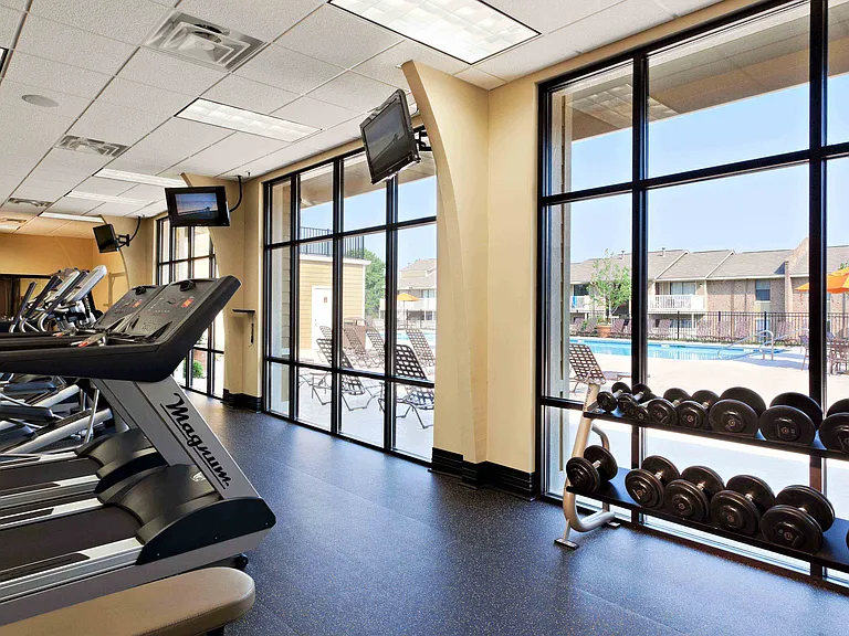 Fitness center with cardio equipment and free weights