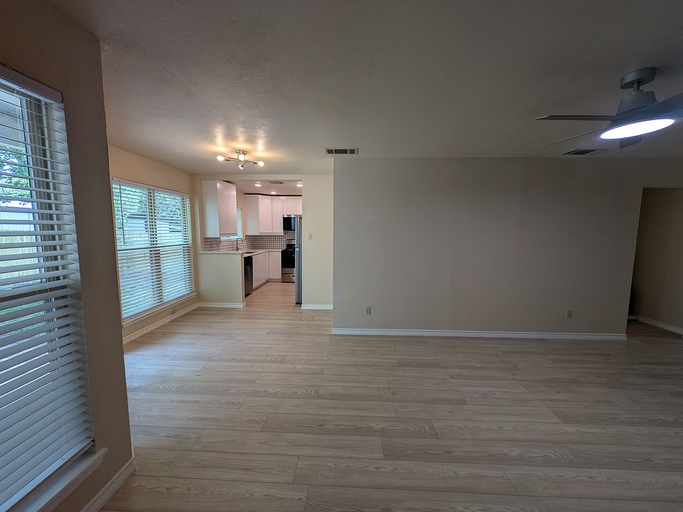 Living room looking at the dining area and kitchen