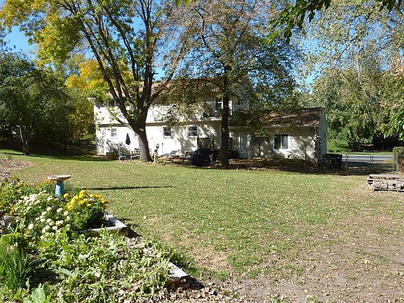 back yard with veggie gardens