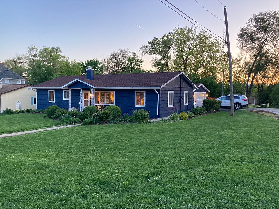 View from the corner. Front of the house faces east and garage side faces north