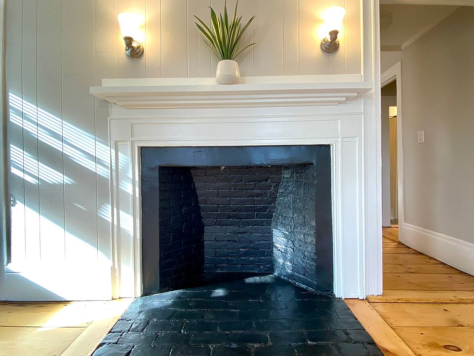 Original fireplace and craftsman woodwork