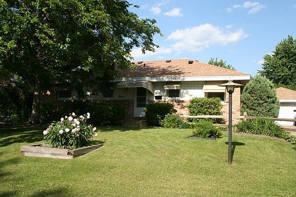 Front of home, profesionally landscaped