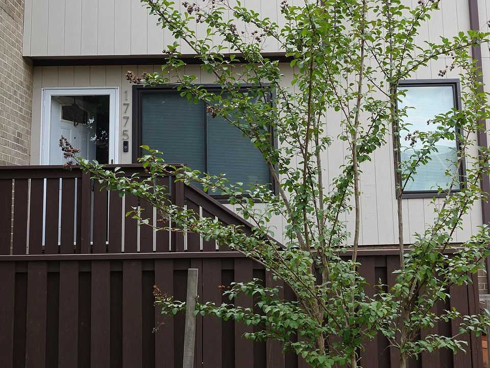Townhouse style condo (2 floors). The outside patio area offers a large walled-in deck perfect for grilling and keeping plants.