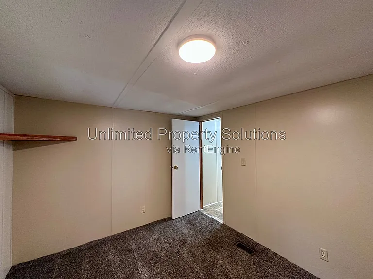 9499 Wendi Dr NE #J — Photo 13