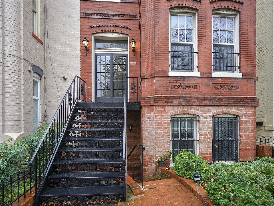 Private Front entrance to English basement (mailboxes at top of wrought iron stairs). No shared space or air- cats welcomed, mute dogs considered on a case by case basis with extra pet rental fee.