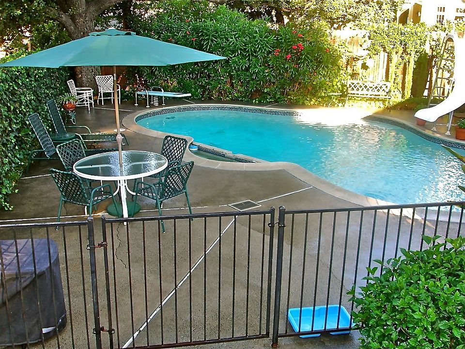 Sparkling Pool with Slide and Spring Diving Board
