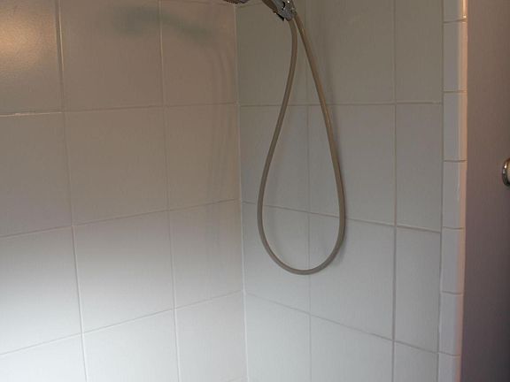 Recently tiled shower with tub