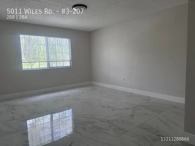 5011 Wiles Rd #3-207 — Photo 4