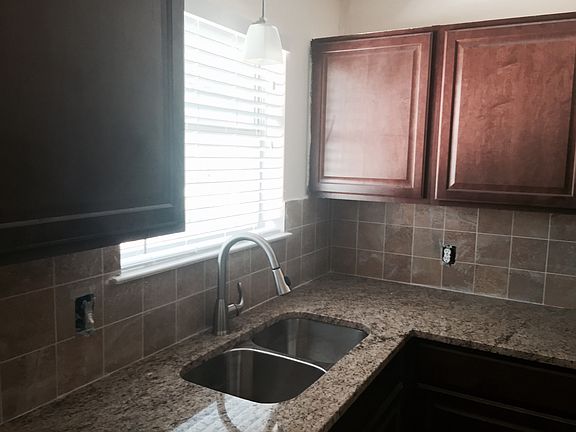 Granite counters with stainless steel sink
