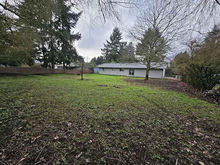 Huge backyard. Fenced completely and gated on two sides.