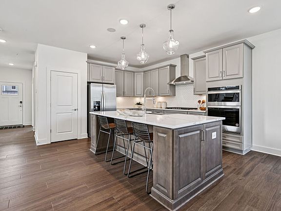 Kitchen with Quartz Countertops and KitchenAid Appliances