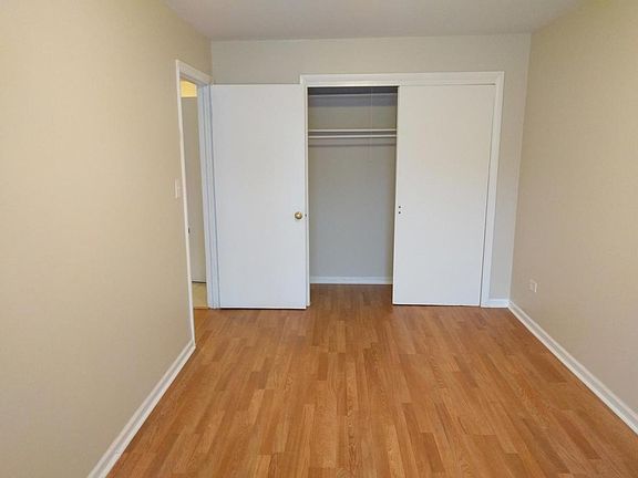 Bedroom with large double closet