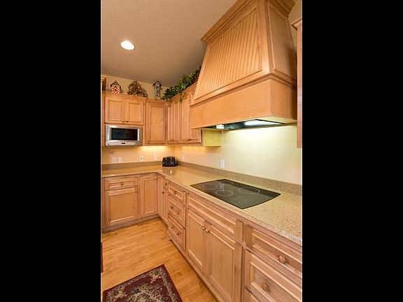 The cook top features a custom built ventilation hood.