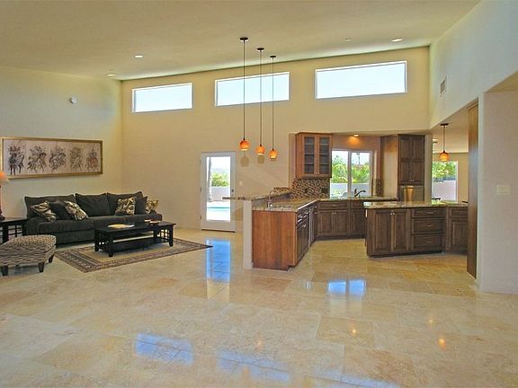 Walk in and enjoy the soaring ceiling, low-e windows, nat stone flrs & more!