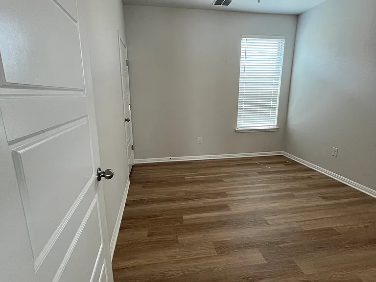 with plank flooring throughout