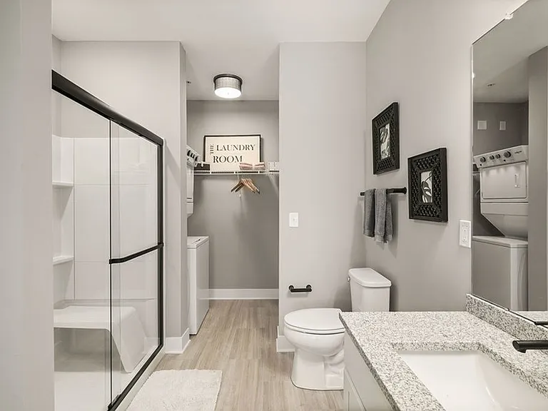 Iron Works Model Bathroom and Closet with In-Unit Laundry