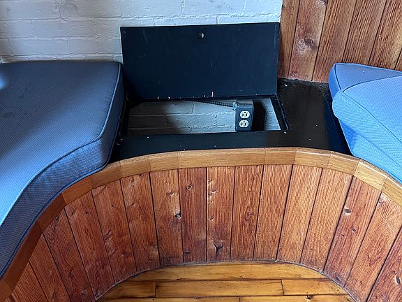 Storage inside cushioned living room seating