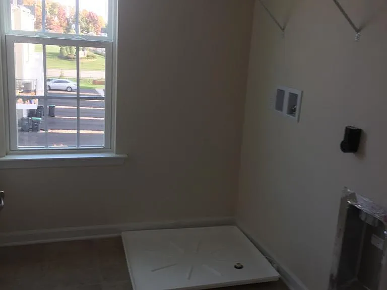 Laundry room . washer dryer are provided.