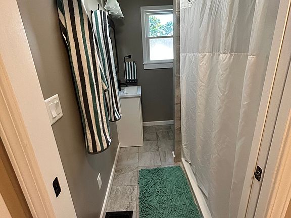 Tiled, walk in shower