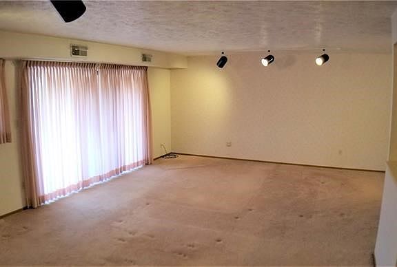 View from Dining Area to Living room. Kitchen on the right.