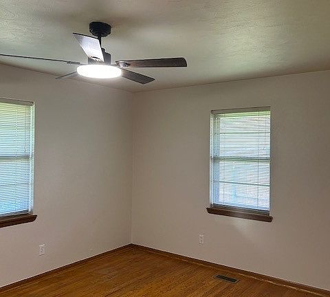 Large bedrooms with hardwood floors and ceiling fans!