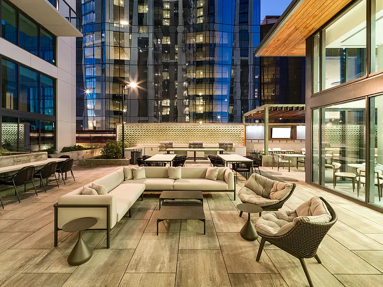 An inviting outdoor terrace at Modera McGavock, offering refined seating and city views just a short drive from the energy of downtown Nashville.