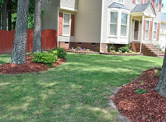 Well manicured yard and landscaping with full irrigation