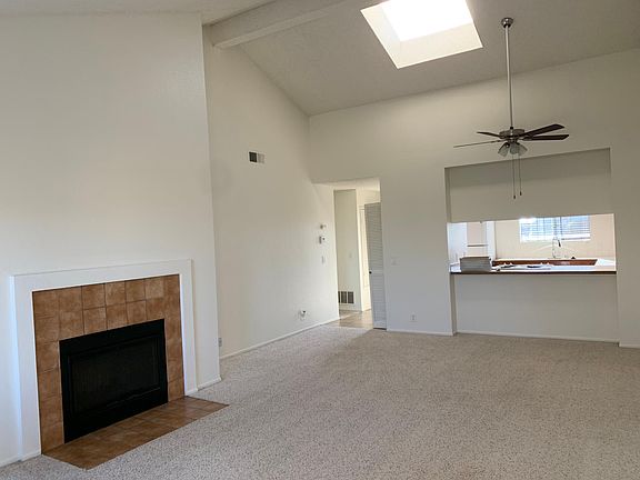 Wood Burning Fireplace and Skylight! Lovely Features in the Condo