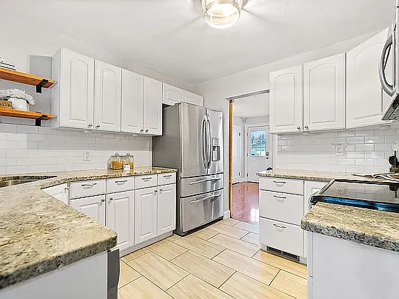 712 E 39th Ave — Photo 5