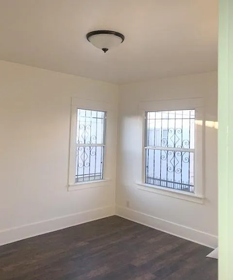 Living Room (windows no longer have bars, new photos coming soon)