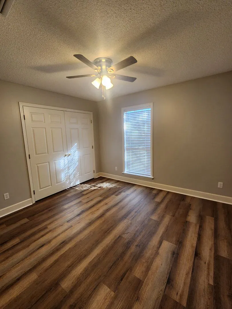Spacious 4BR Home with New LVP Flooring and Fenced Backyard Oasis — Photo 4