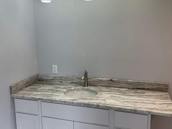 Master bathroom granite and new white 48" vanity with hand painted pendant lights
