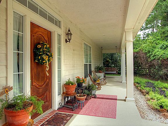 Visit with family and friends on the covered front porch.