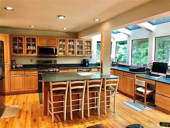 This kitchen will be the favorite gathering place for every party! Enjoy extra cooking space with a large island and breakfast bar.