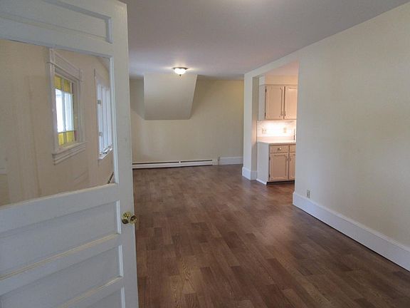 Entering the apartment.