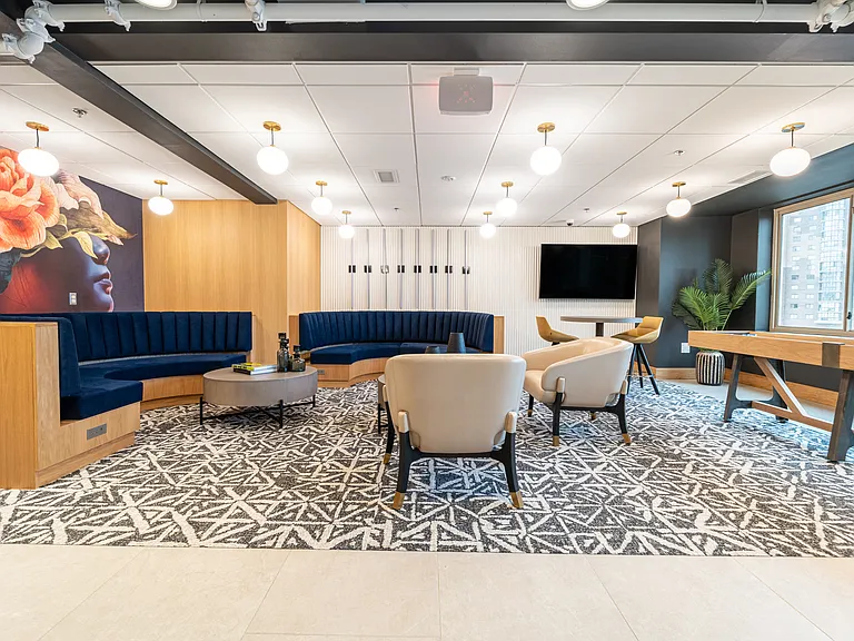 Resident lounge with shuffleboard table
