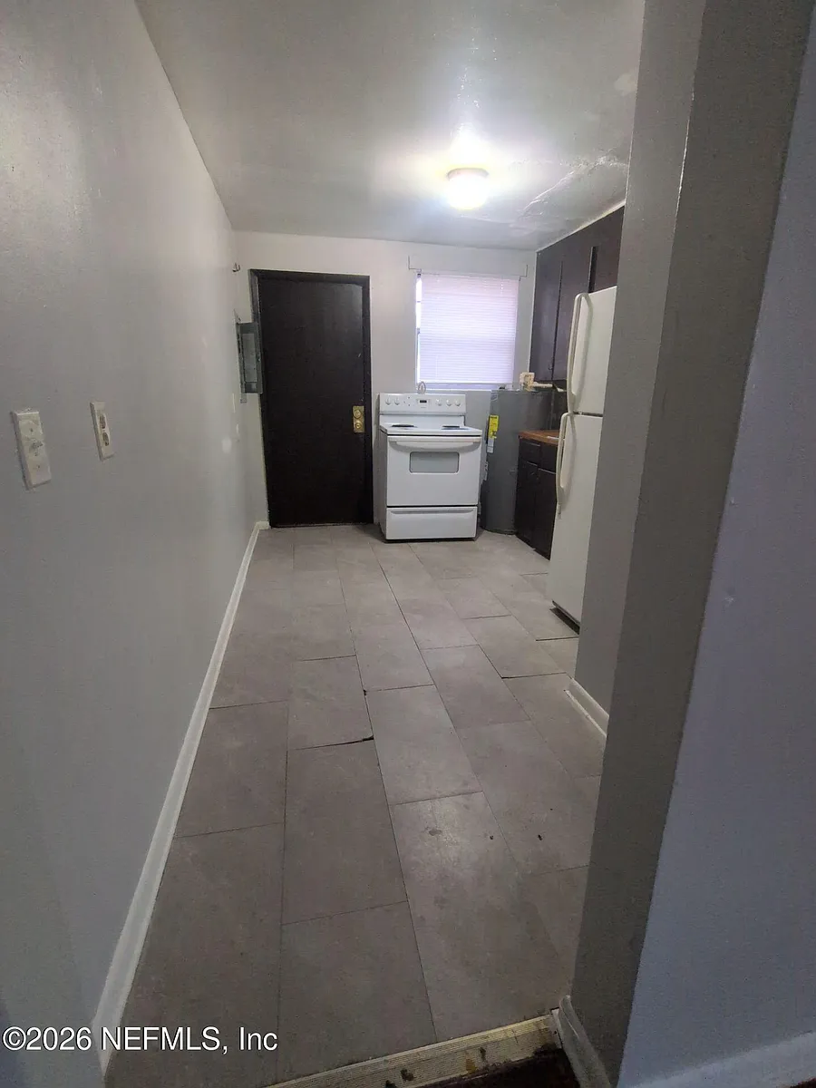 Building Photo - 1145 W 25th St #1