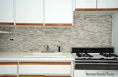 Rented by Norman Raindel, LREB