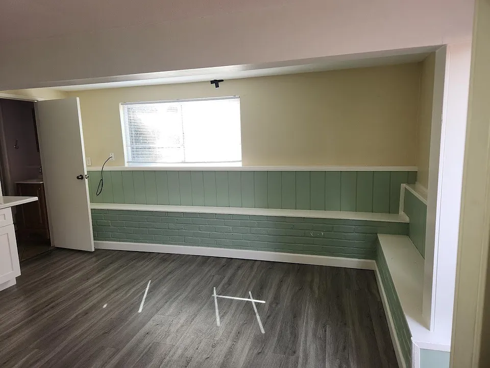Living room. Door is door to bathroom.
