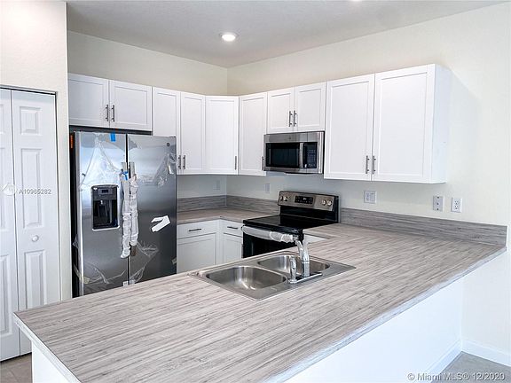 2nd image of 10472 W 32nd Ln #10472