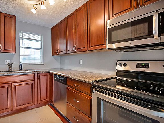 High end wood cabinets and granite.