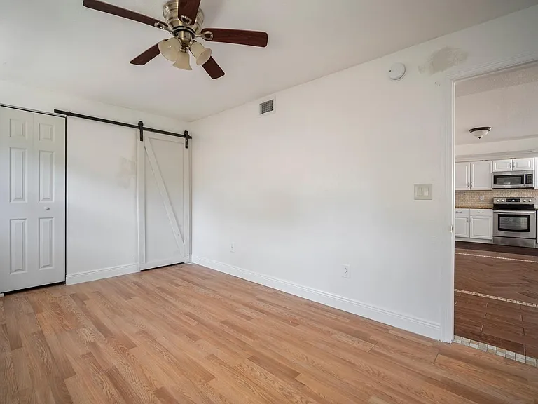 Primary Room: Rear view with double closet in view